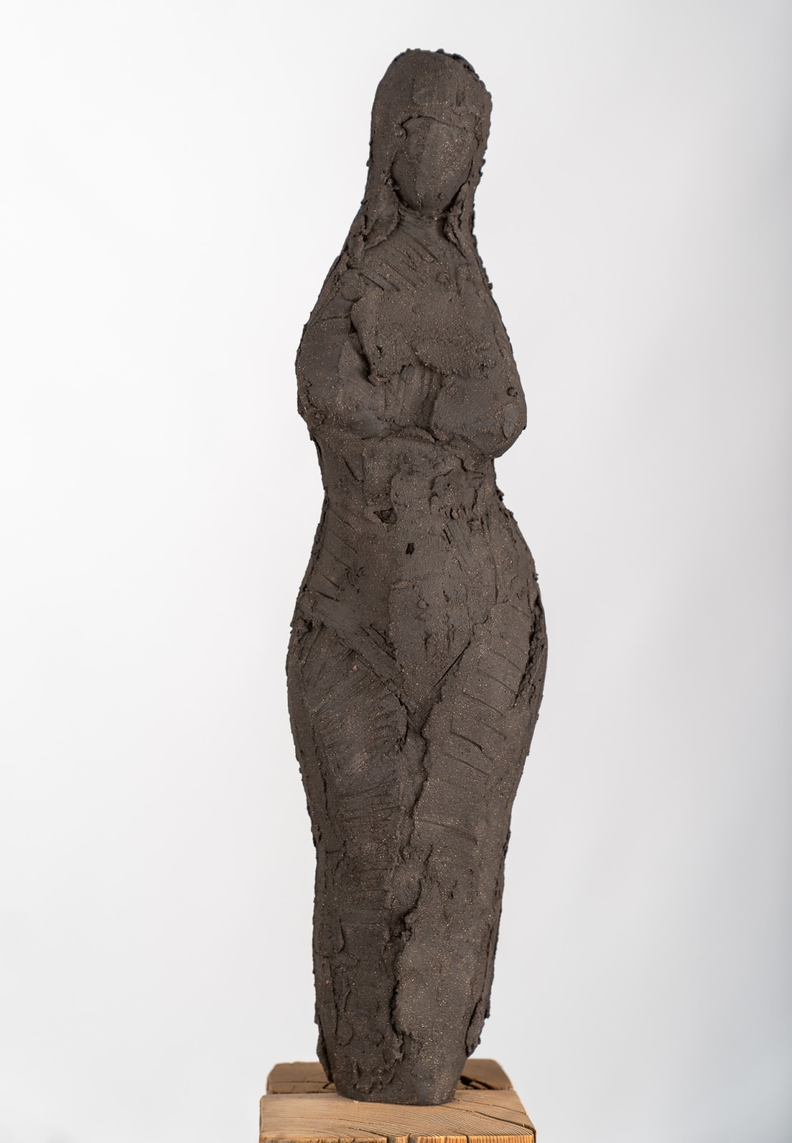 Standing abstract figurative ceramic sculpture by artist Emilio DiIorio