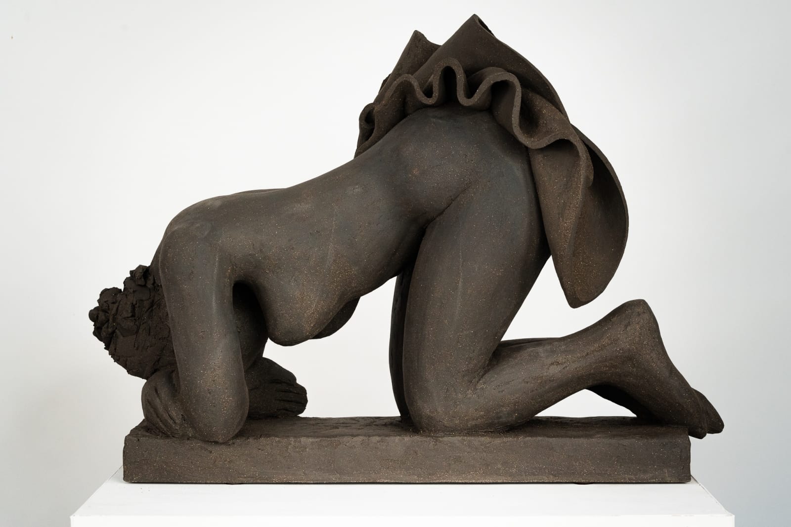 Figurative ceramics sculpture by artist Emilio DiIorio. Female figure is No. 5 in artist's Seated Bathers series in black clay.