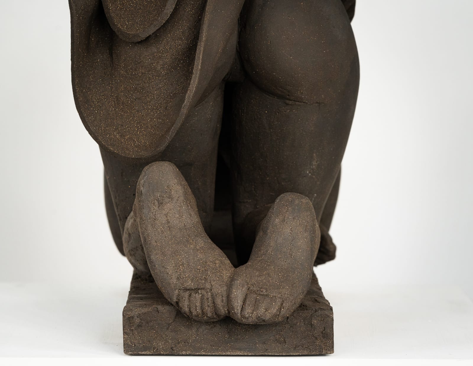 Figurative ceramics sculpture by artist Emilio DiIorio. Female figure is No. 5 in artist's Seated Bathers series in black clay.