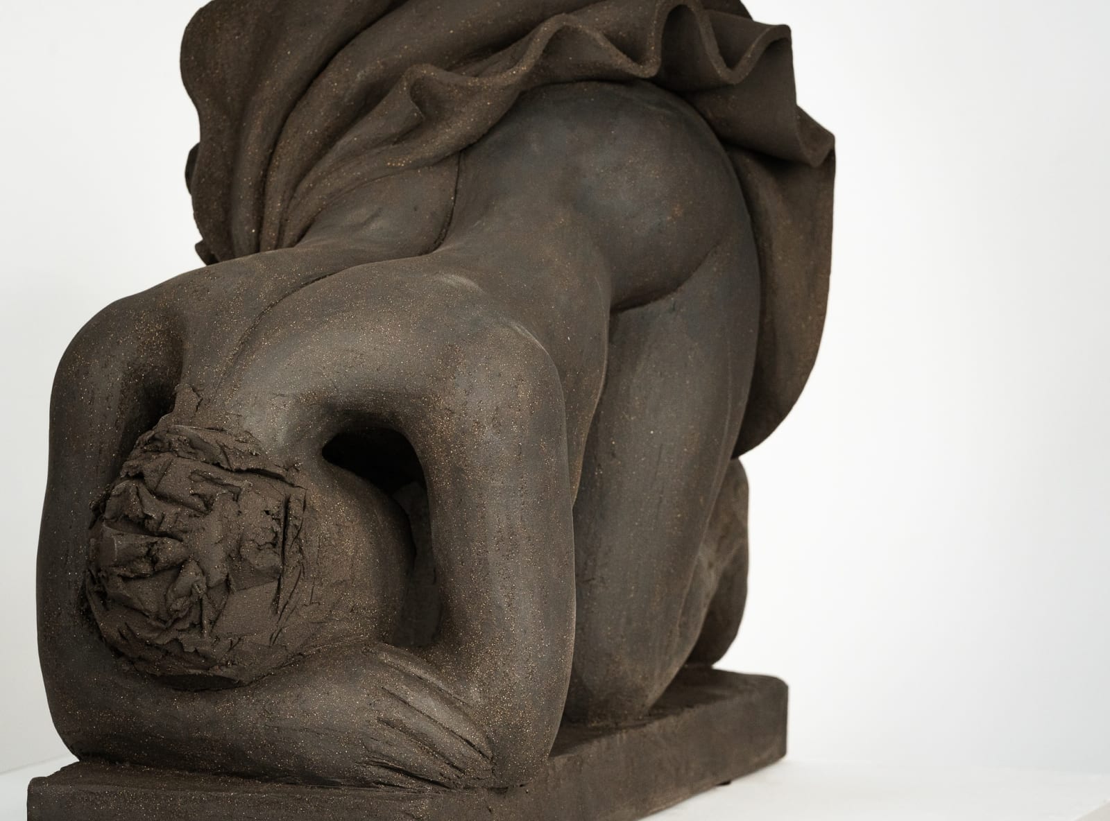 Figurative ceramics sculpture by artist Emilio DiIorio. Female figure is No. 5 in artist's Seated Bathers series in black clay.