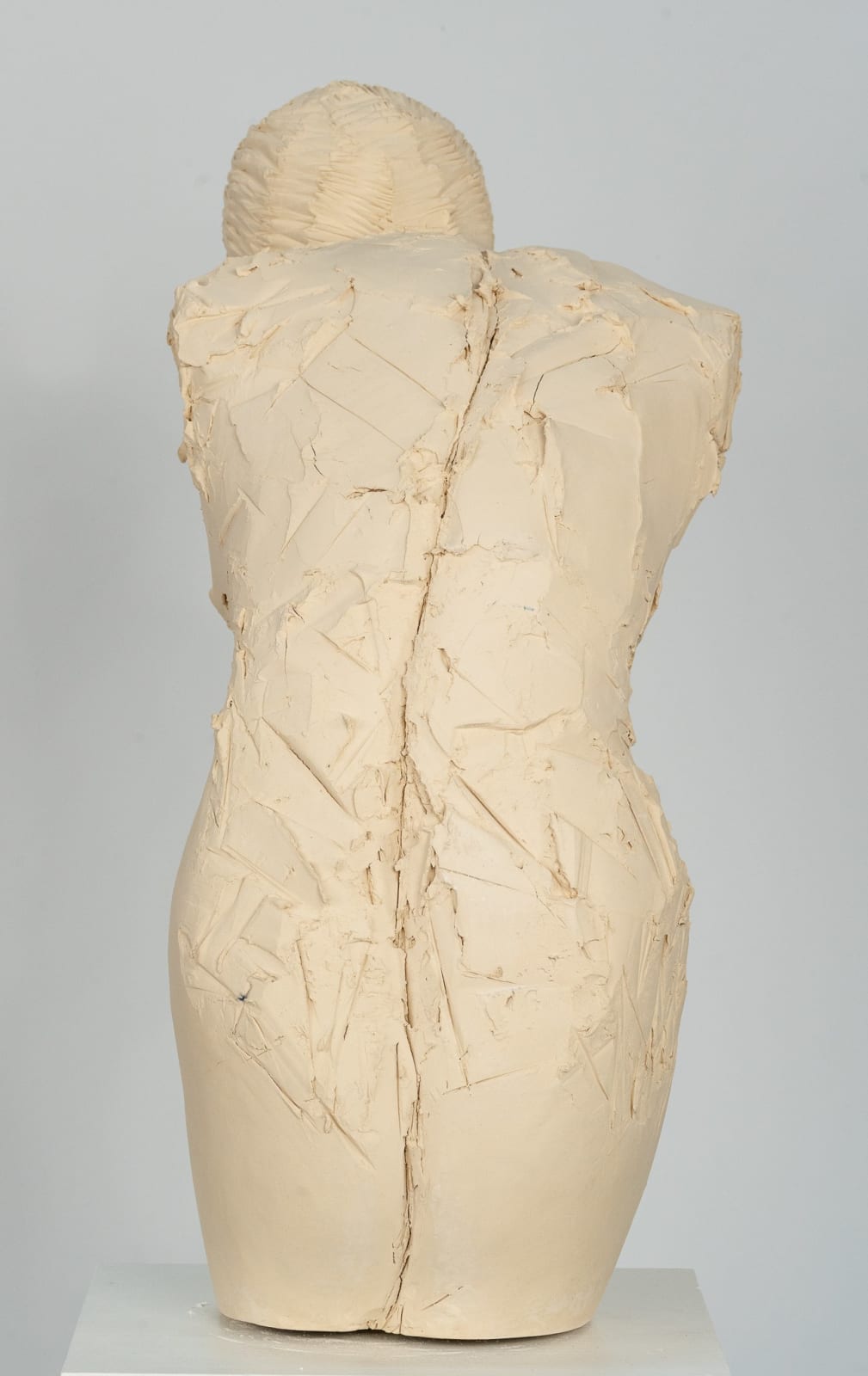 Fragmented figurative female torso in white ceramic. No. 3 in sculptor Emilio DiIorio's Sei donne series..