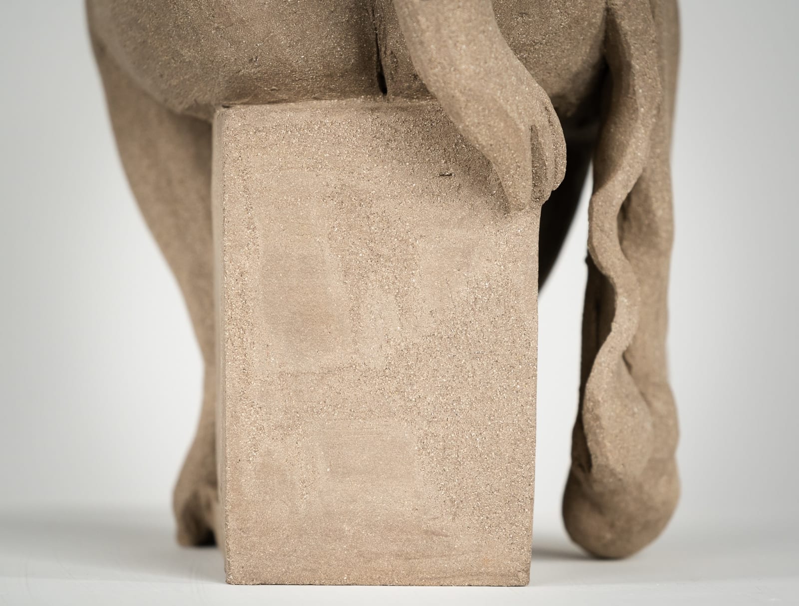 Figurative ceramics sculpture by artist Emilio DiIorio. Female figure is No. 4 in artist's Seated Bathers series in gray clay.