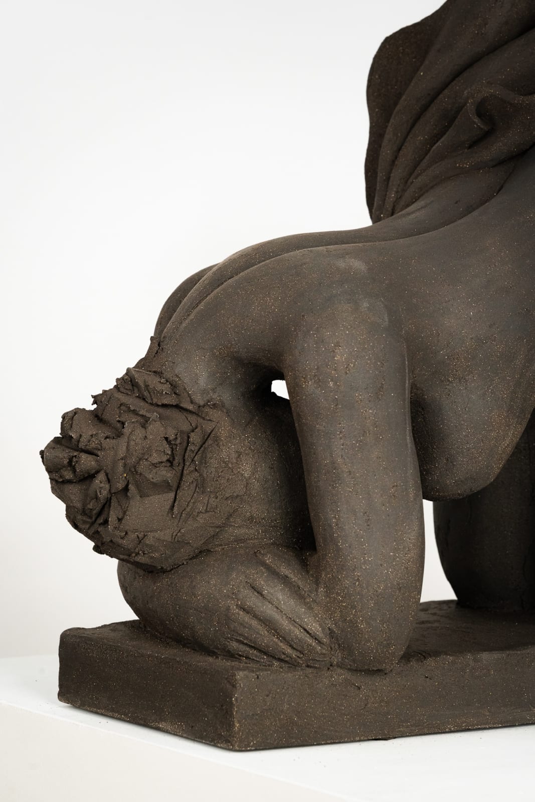 Figurative ceramics sculpture by artist Emilio DiIorio. Female figure is No. 5 in artist's Seated Bathers series in black clay.