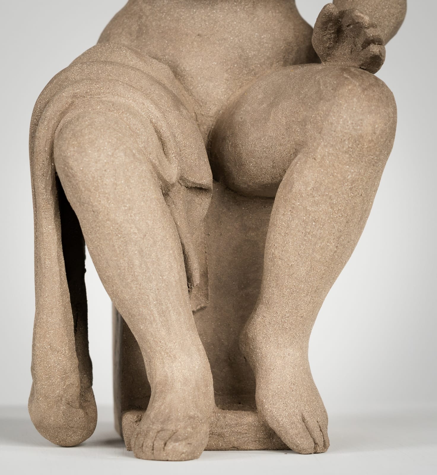 Figurative ceramics sculpture by artist Emilio DiIorio. Female figure is No. 4 in artist's Seated Bathers series in gray clay.