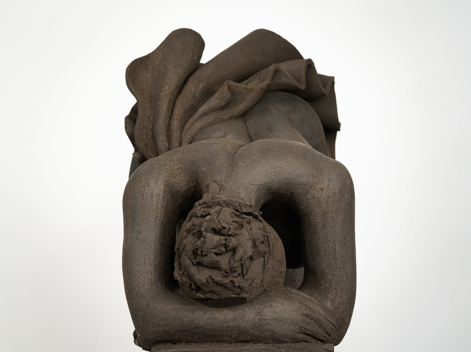Figurative ceramics sculpture by artist Emilio DiIorio. Female figure is No. 5 in artist's Seated Bathers series in black clay.
