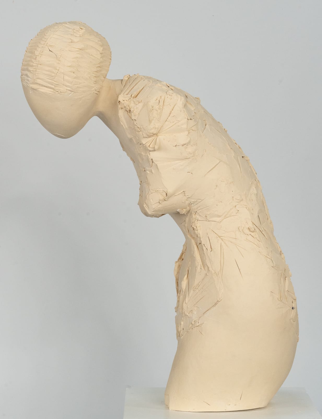 Fragmented figurative female torso in white ceramic. No. 3 in sculptor Emilio DiIorio's Sei donne series..