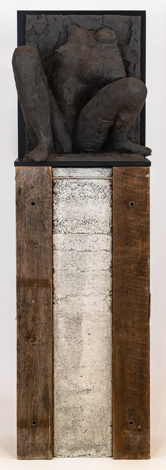 Ceramic relief in black clay in sculptor Emilio DiIorio's Women of Troy series.