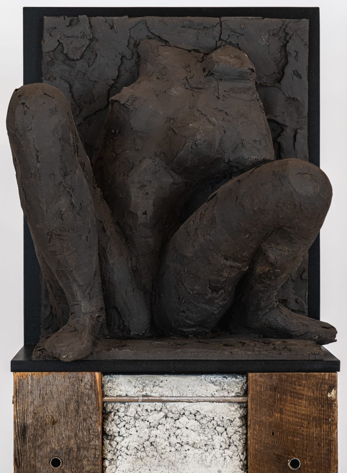 Ceramic relief in black clay in sculptor Emilio DiIorio's Women of Troy series.