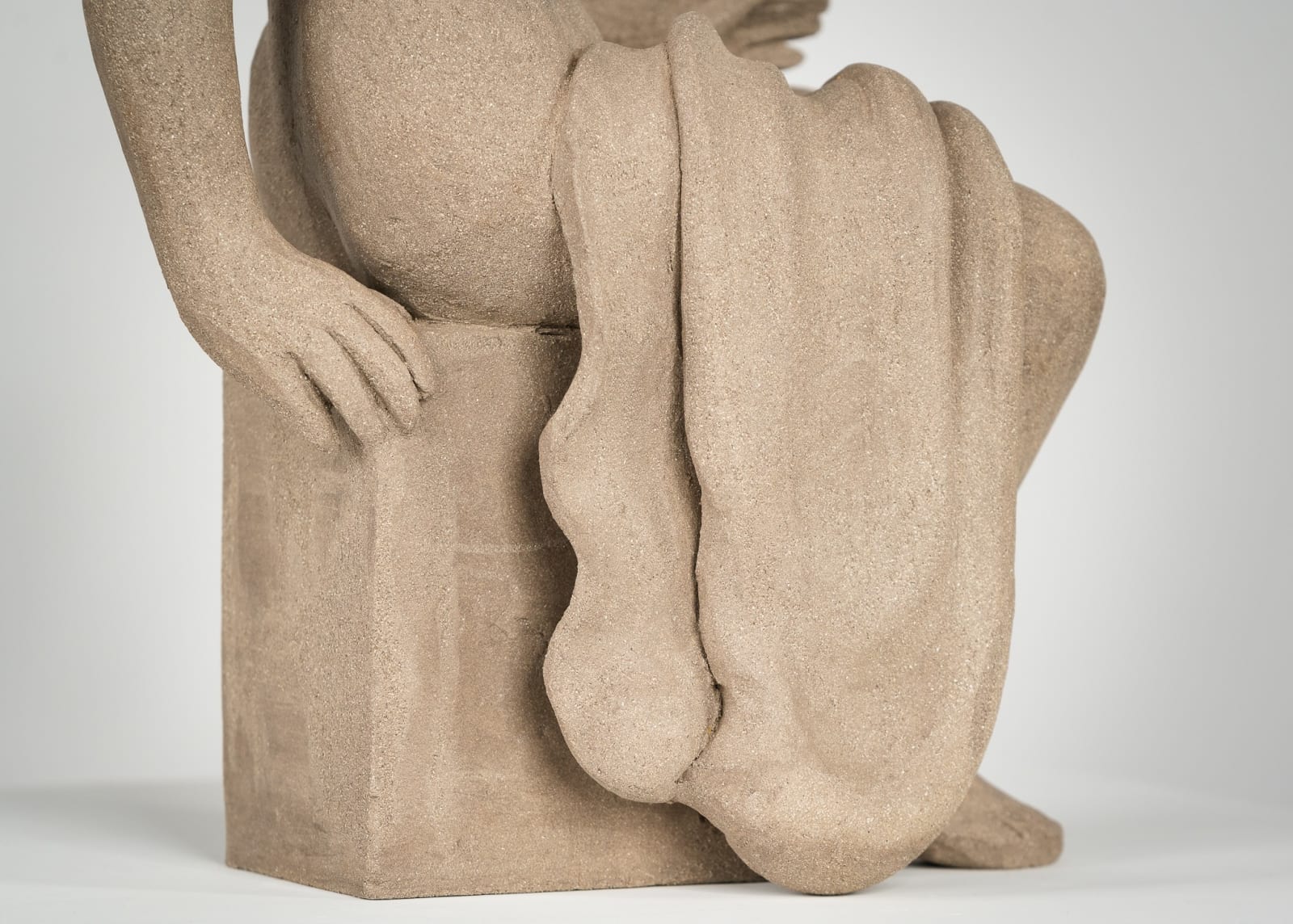 Figurative ceramics sculpture by artist Emilio DiIorio. Female figure is No. 4 in artist's Seated Bathers series in gray clay.