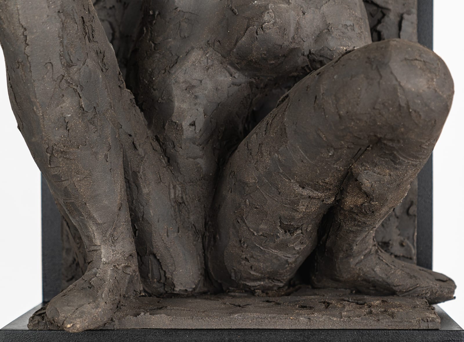Ceramic relief in black clay in sculptor Emilio DiIorio's Women of Troy series.