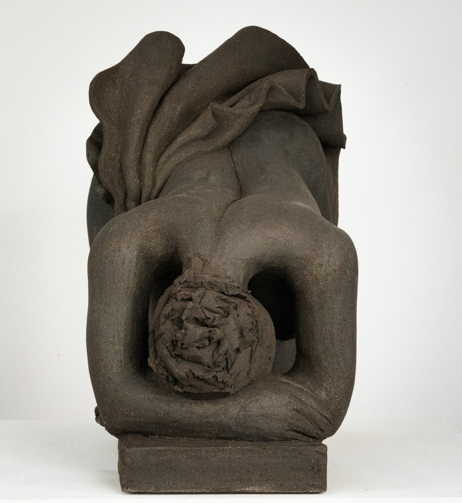 Figurative ceramics sculpture by artist Emilio DiIorio. Female figure is No. 5 in artist's Seated Bathers series in black clay.