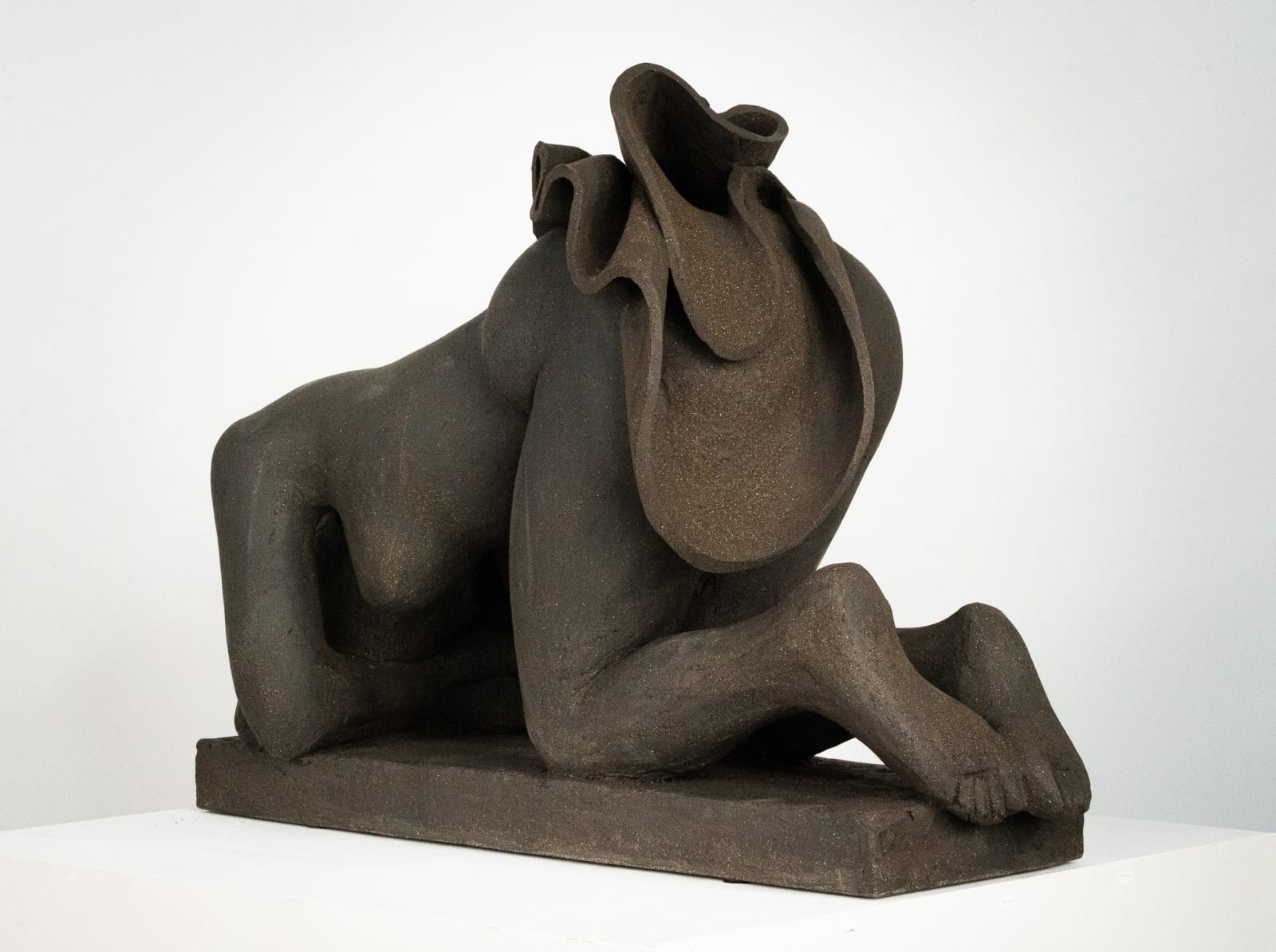 Figurative ceramics sculpture by artist Emilio DiIorio. Female figure is No. 5 in artist's Seated Bathers series in black clay.