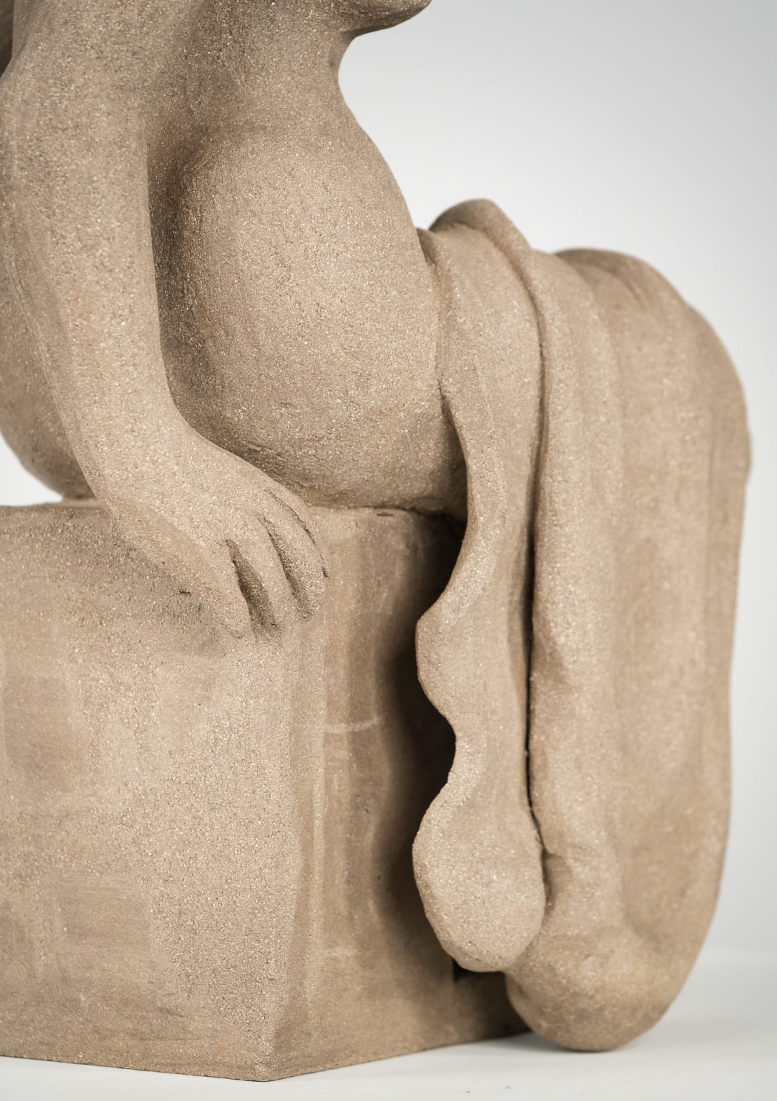 Figurative ceramics sculpture by artist Emilio DiIorio. Female figure is No. 4 in artist's Seated Bathers series in gray clay.