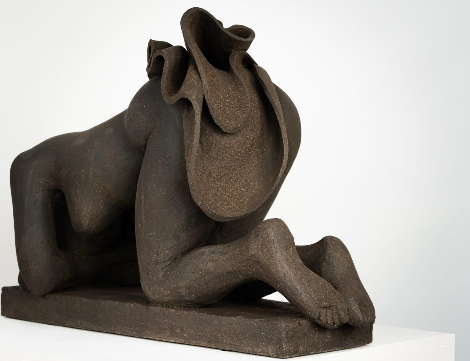Figurative ceramics sculpture by artist Emilio DiIorio. Female figure is No. 5 in artist's Seated Bathers series in black clay.