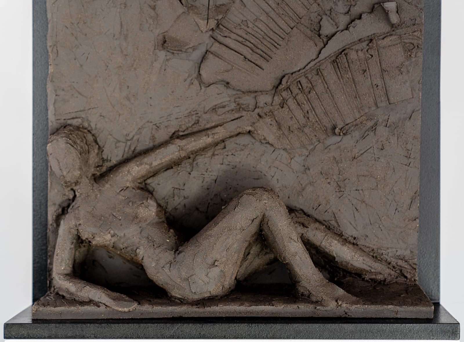 Sculptor Emilio DiIorio's series of 9 Greek Muses in black clay. Ceramic figurative relief is 2nd of 9.