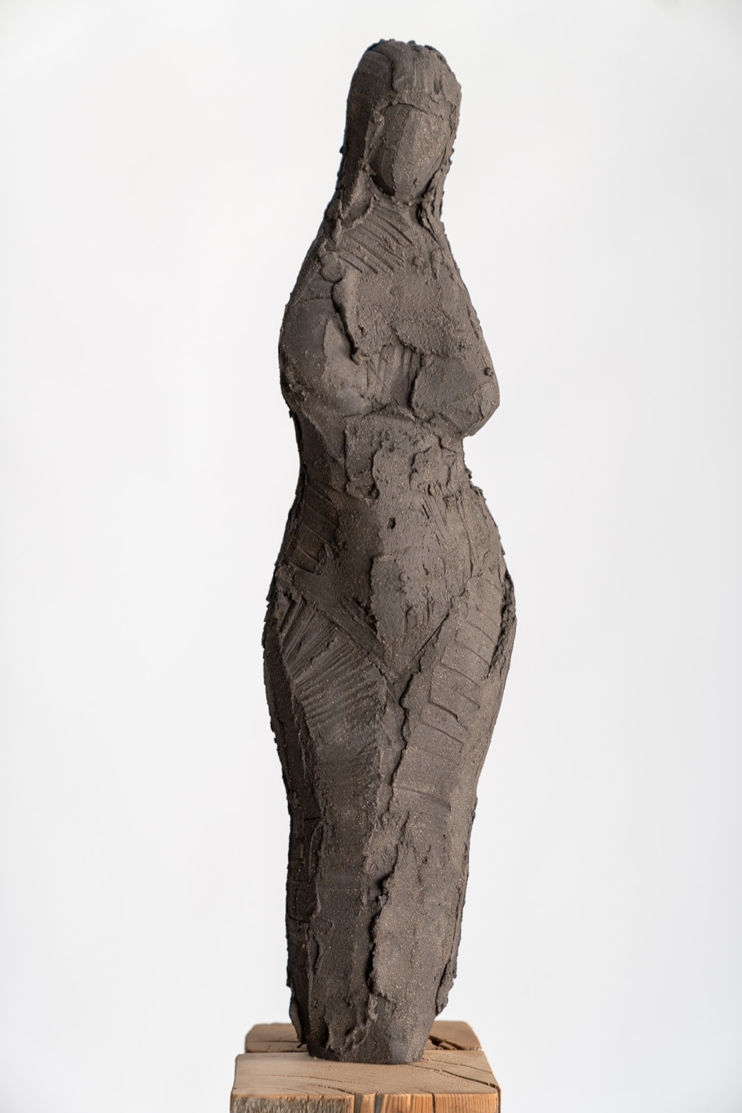 Standing abstract figurative ceramic sculpture by artist Emilio DiIorio