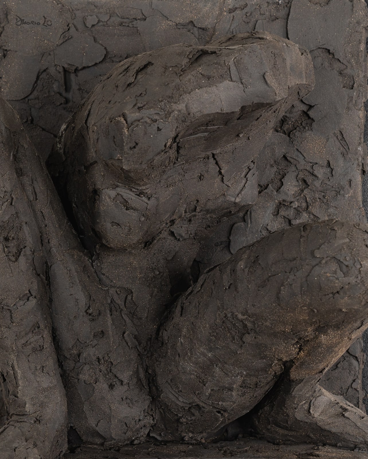 Ceramic relief in black clay in sculptor Emilio DiIorio's Women of Troy series.