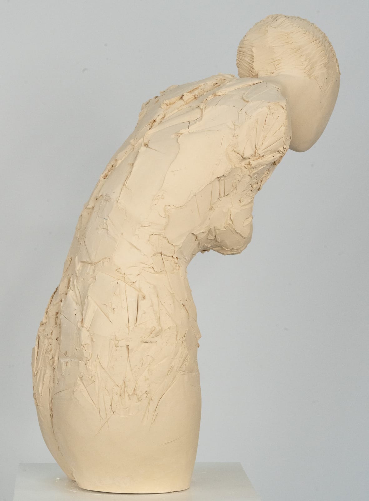 Fragmented figurative female torso in white ceramic. No. 3 in sculptor Emilio DiIorio's Sei donne series..