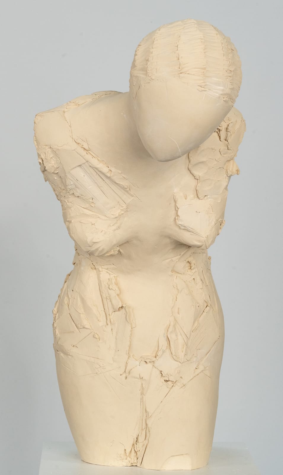 Fragmented figurative female torso in white ceramic. No. 3 in sculptor Emilio DiIorio's Sei donne series..