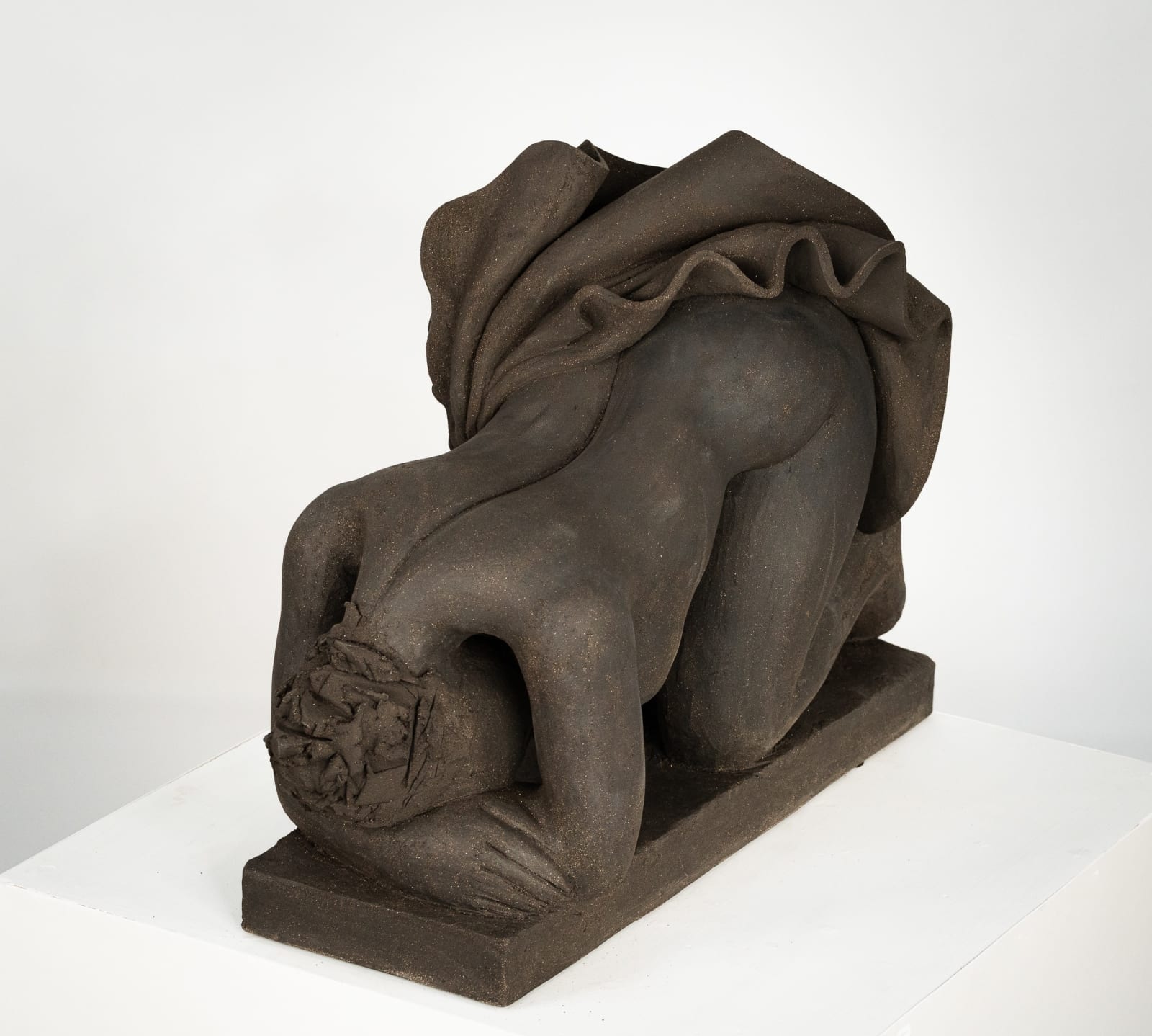 Figurative ceramics sculpture by artist Emilio DiIorio. Female figure is No. 5 in artist's Seated Bathers series in black clay.