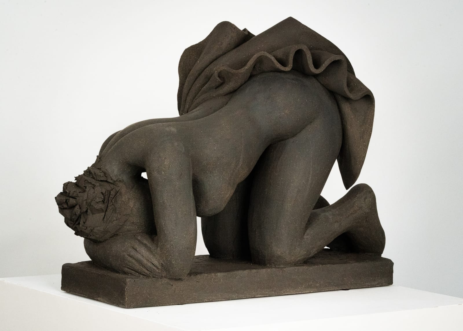 Figurative ceramics sculpture by artist Emilio DiIorio. Female figure is No. 5 in artist's Seated Bathers series in black clay.