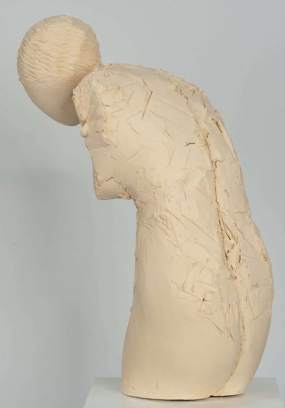 Fragmented figurative female torso in white ceramic. No. 3 in sculptor Emilio DiIorio's Sei donne series..