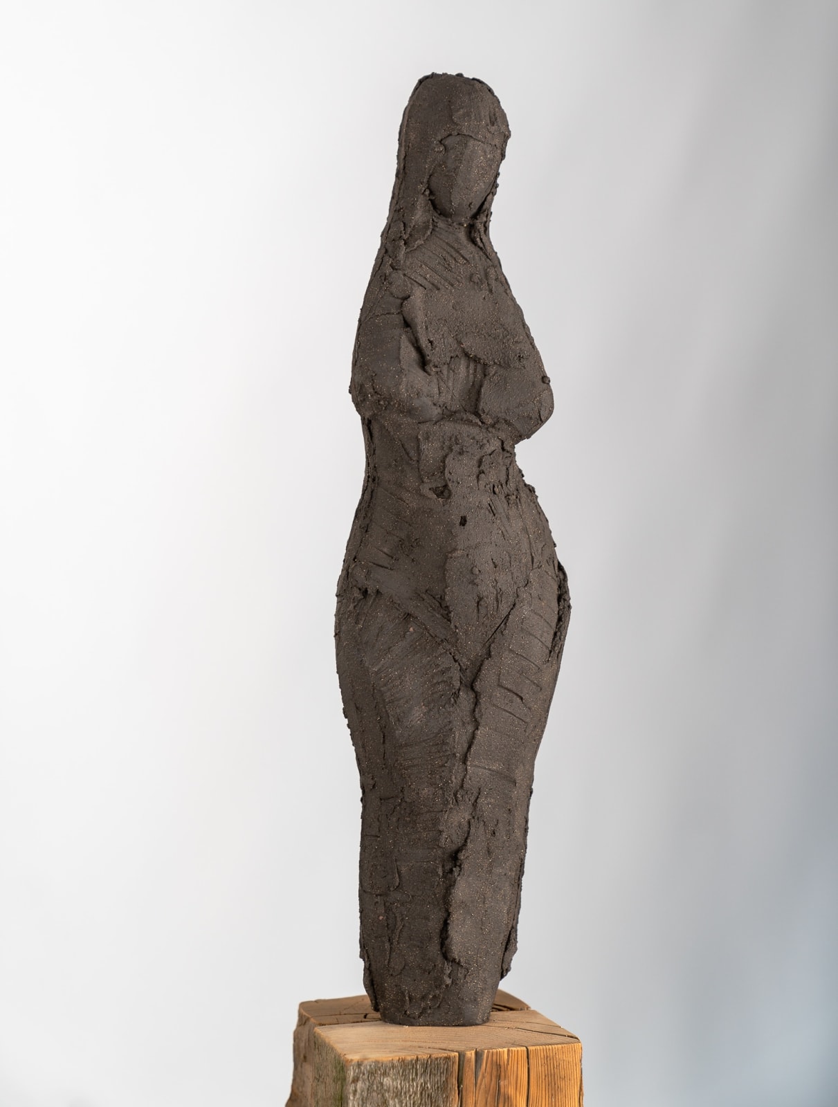 Standing abstract figurative ceramic sculpture by artist Emilio DiIorio
