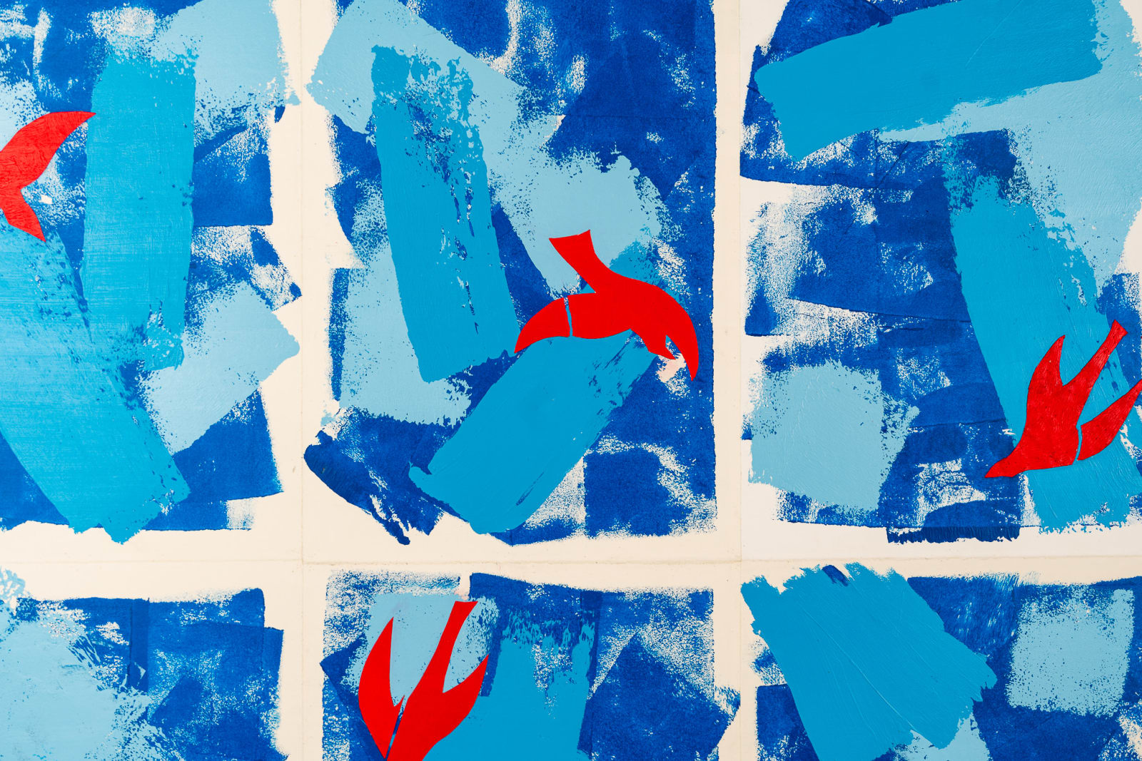 Abstract collage in shades of blue with red birds by artist Emilio DiIorio
