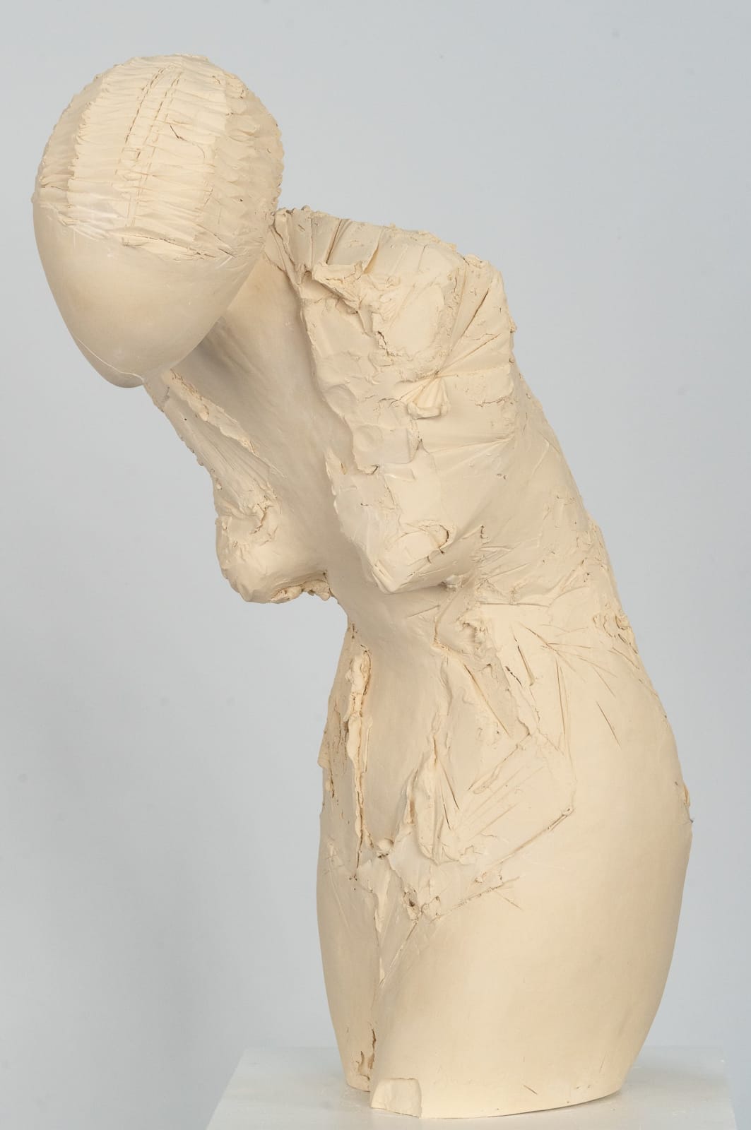 Fragmented figurative female torso in white ceramic. No. 3 in sculptor Emilio DiIorio's Sei donne series..