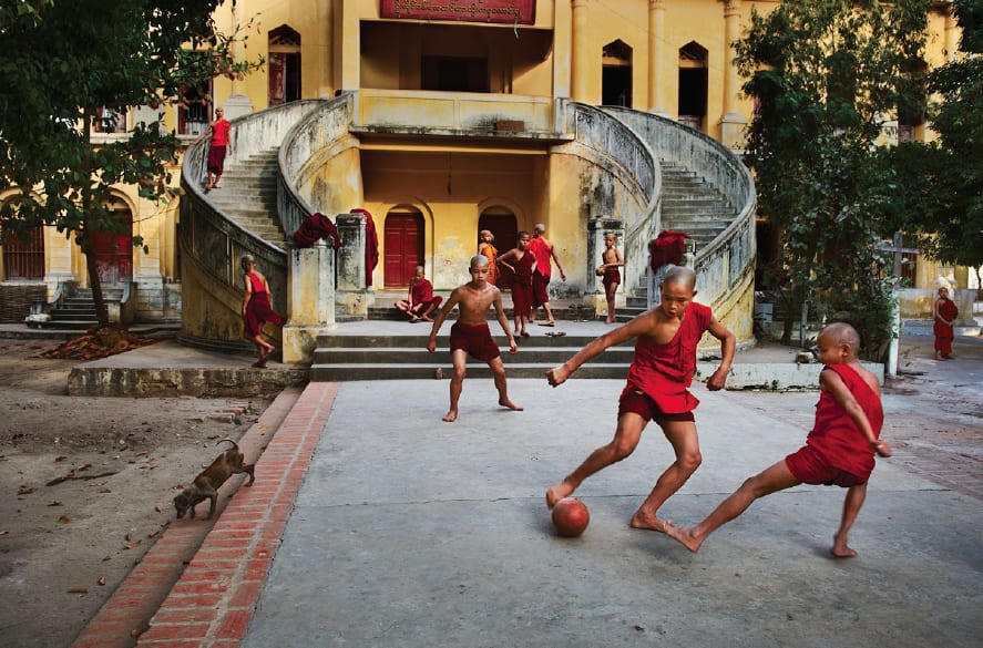 Steve McCurry, Monks Play Football, 1996