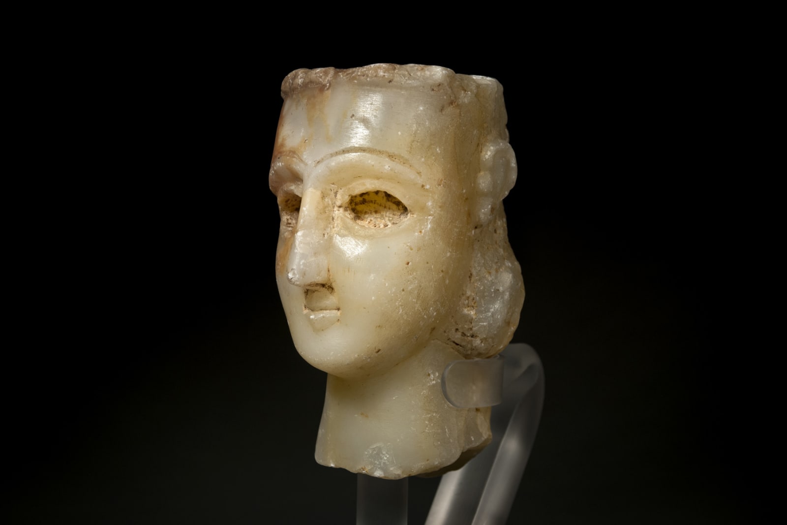 An Alabaster Head of a Sabaean Male., South Arabia, Sabaa, circa 1st millennium B.C.E.