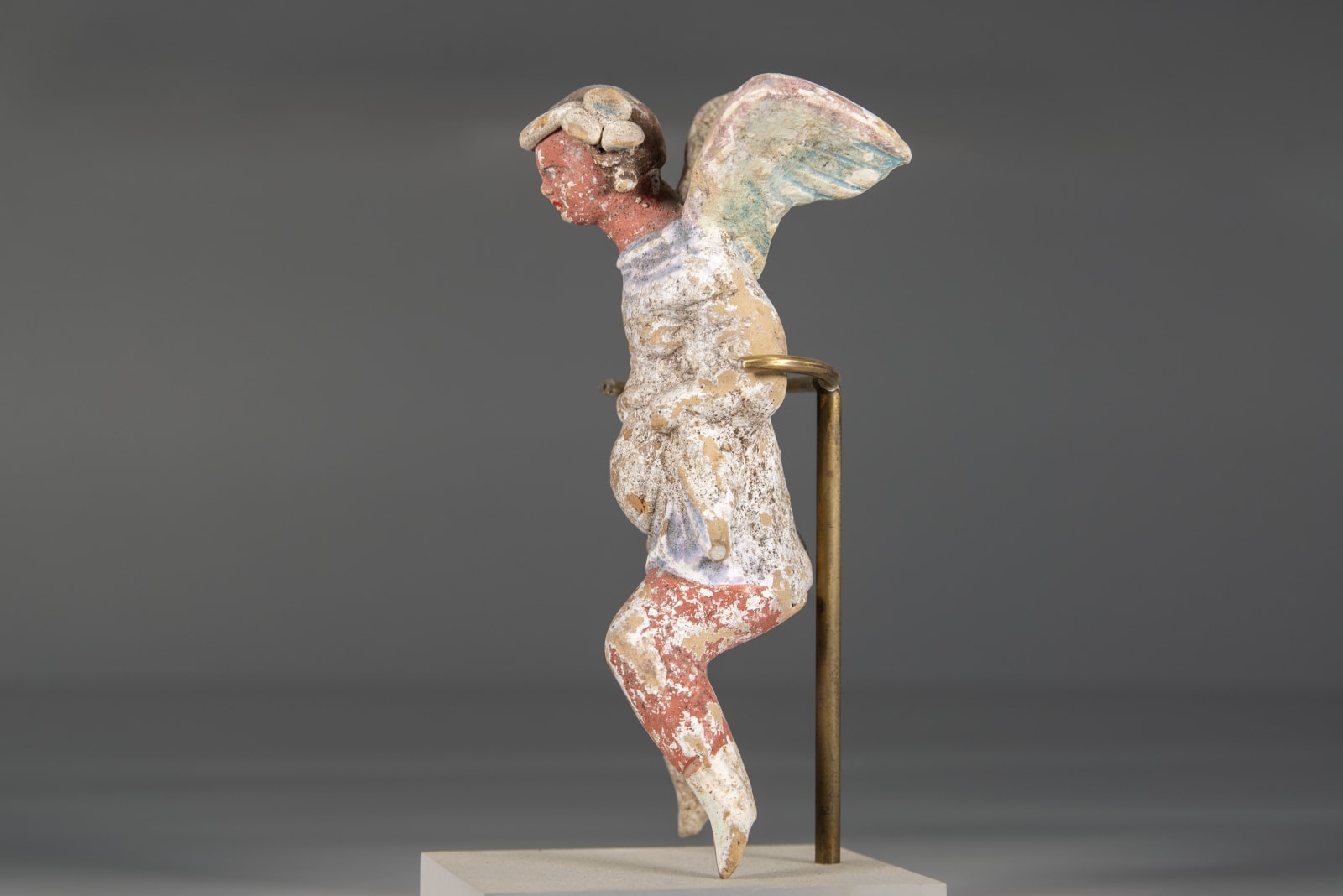 A Greek Statue of a Winged Nike Rider, Greek Magna Graecia, Canossian, circa. 300 B.C.E.