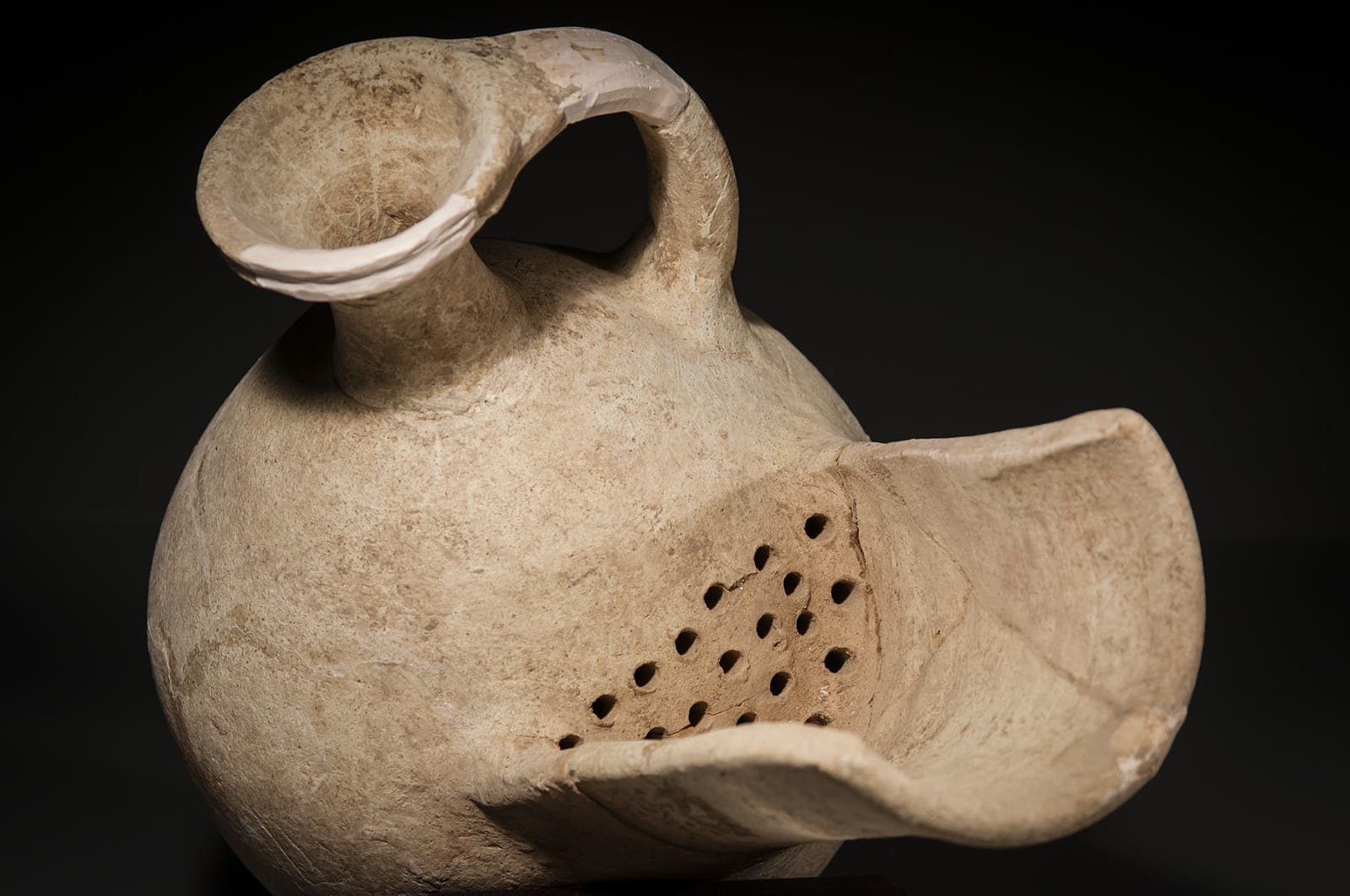 An Israelite/Judean Ceramic Wine Strainer, Iron Age II B, 900 B.C.E. - 800 B.C.E.