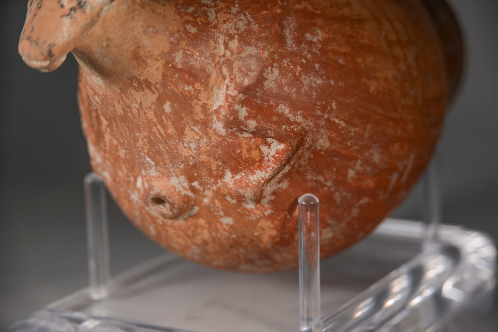 A Persian Red Slip Wine Pottery Rhyton, Circa Late 1st Millennium B.C.E.