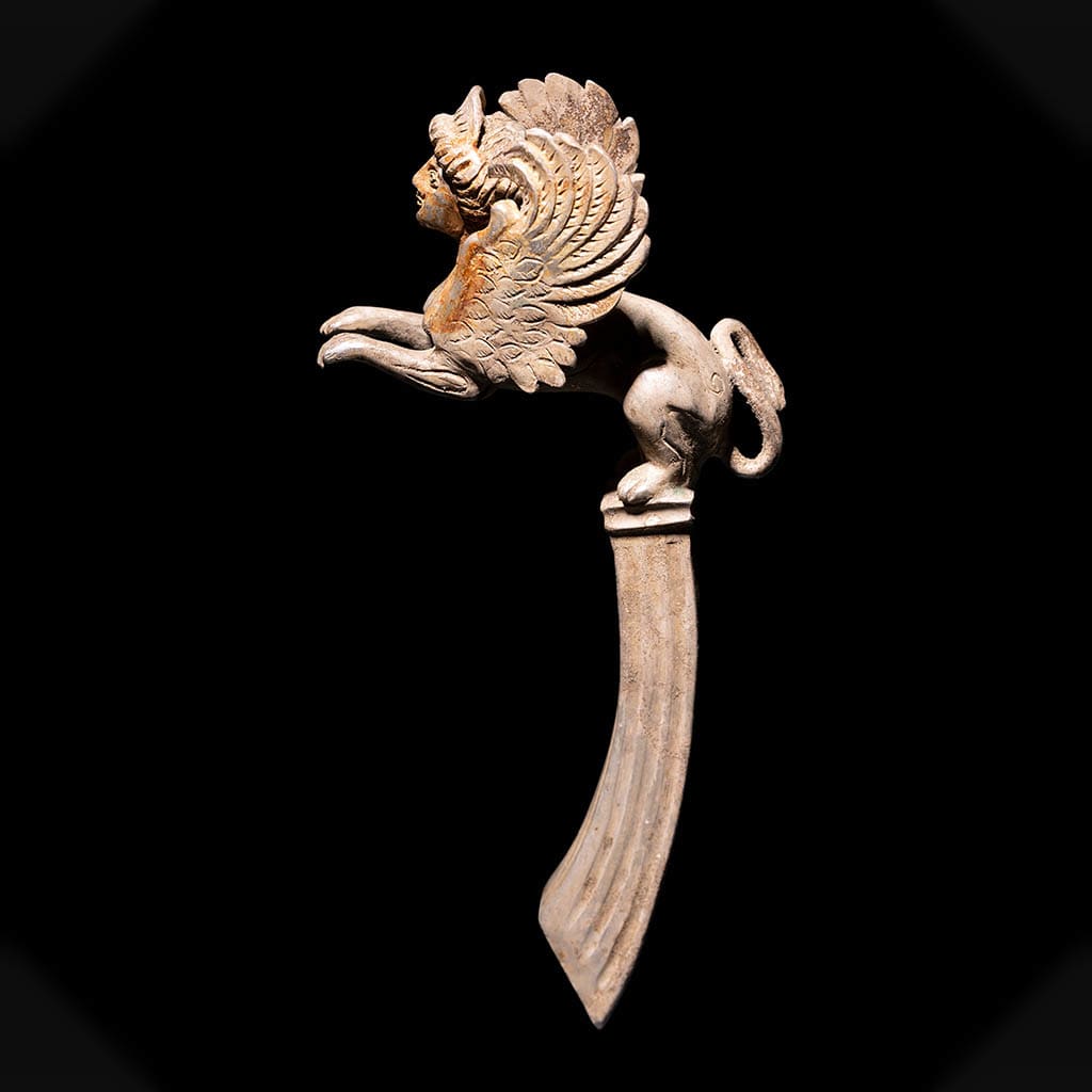 A Pair of Silver Sphinx Handles, Greek, circa 5th – 4th century B.C.E.