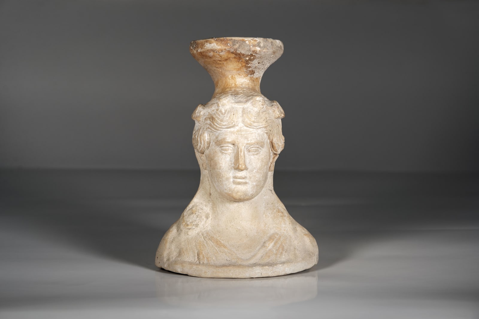 A Ceramic Bust of Dionysus (Bacchus), Roman period, circa 200 C.E. – 400 C.E.