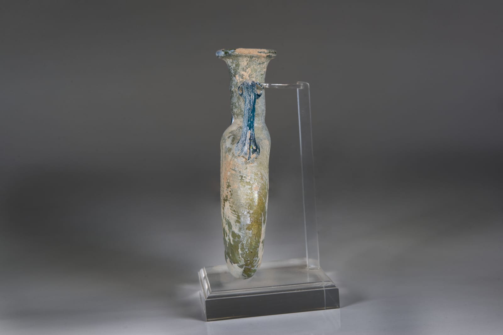 A Large Roman Lentoid Glass Flask, Roman-Early Byzantine period, circa 400 C.E.– 500 C.E.