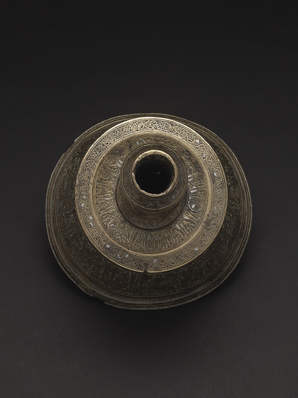 Mamluk Bronze Candlestick Inlaid With Silver Inscription and Decorations, Islamic, 14th Century C.E.