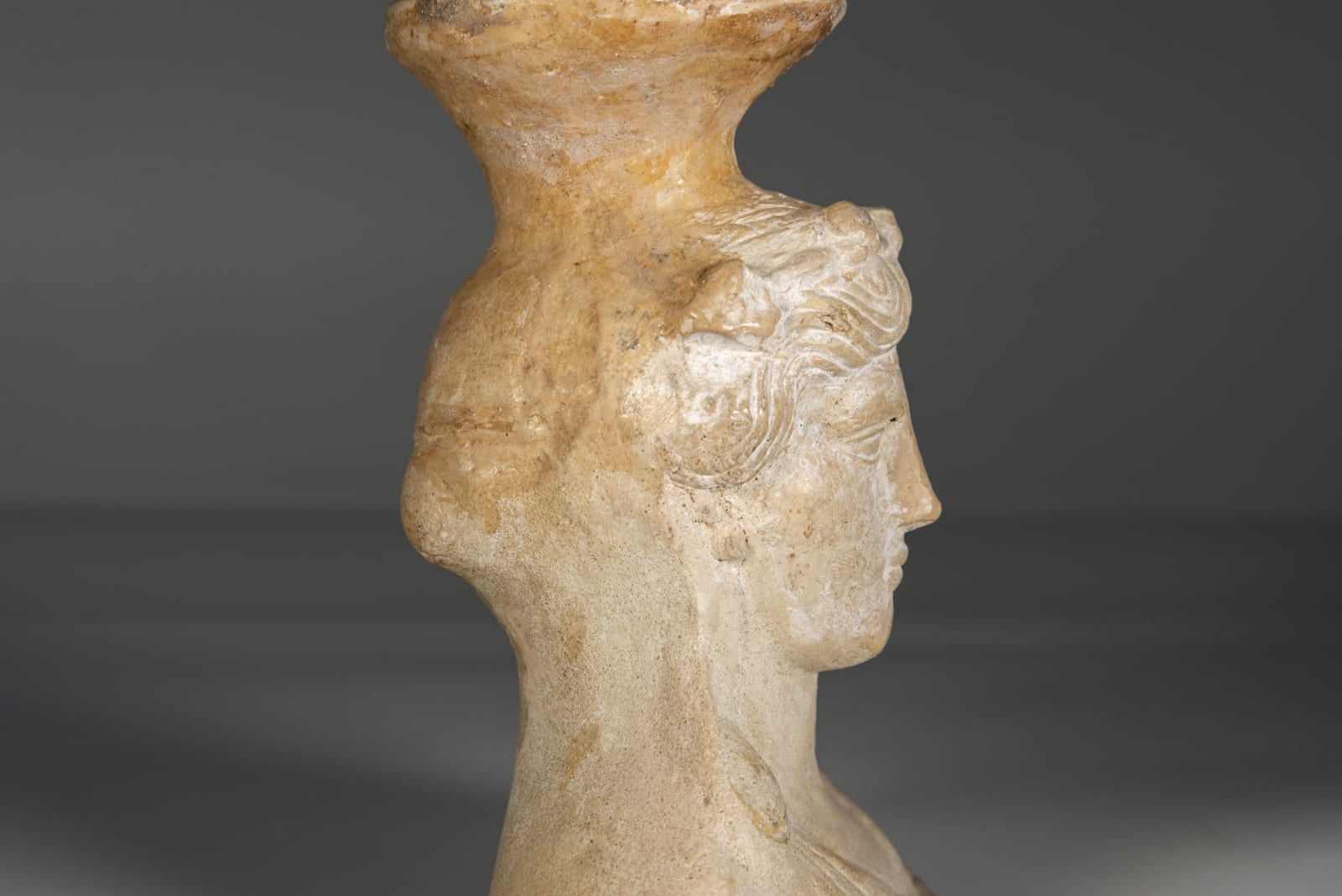 A Ceramic Bust of Dionysus (Bacchus), Roman period, circa 200 C.E. – 400 C.E.