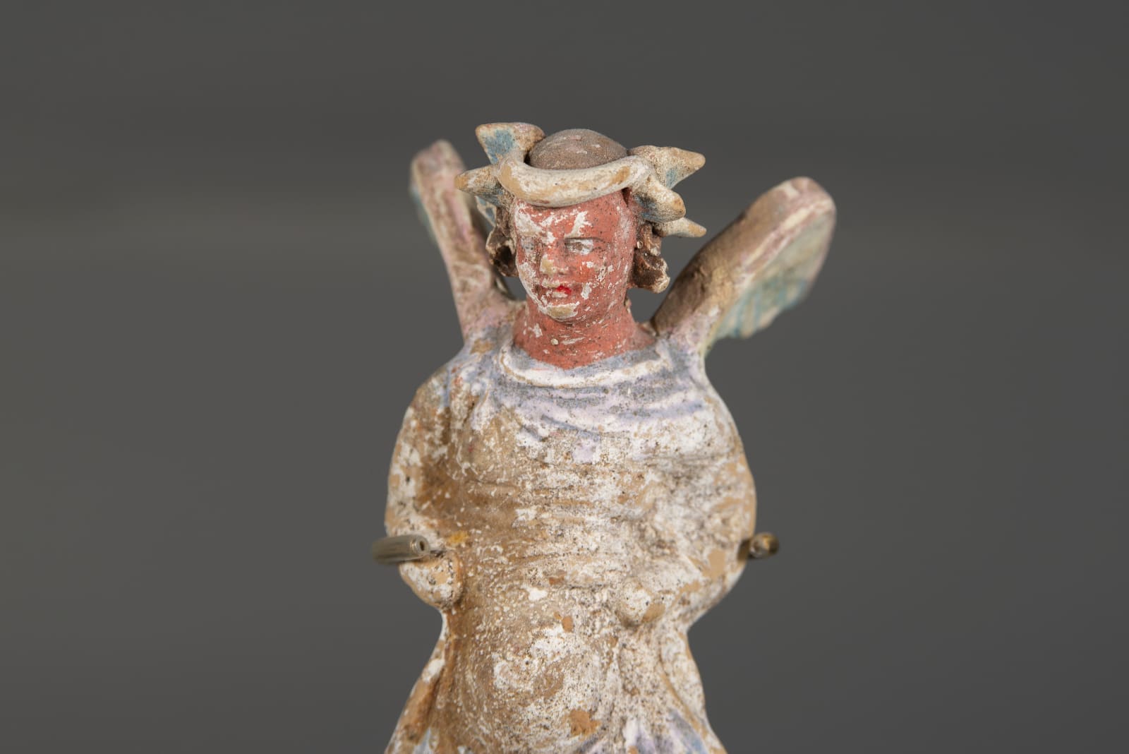 A Greek Statue of a Winged Nike Rider, Greek Magna Graecia, Canossian, circa. 300 B.C.E.