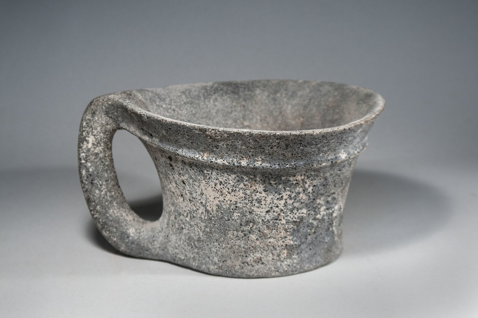 A Large Basalt Stone Mug, Chalcolithic period, Circa 3100 B C.E.