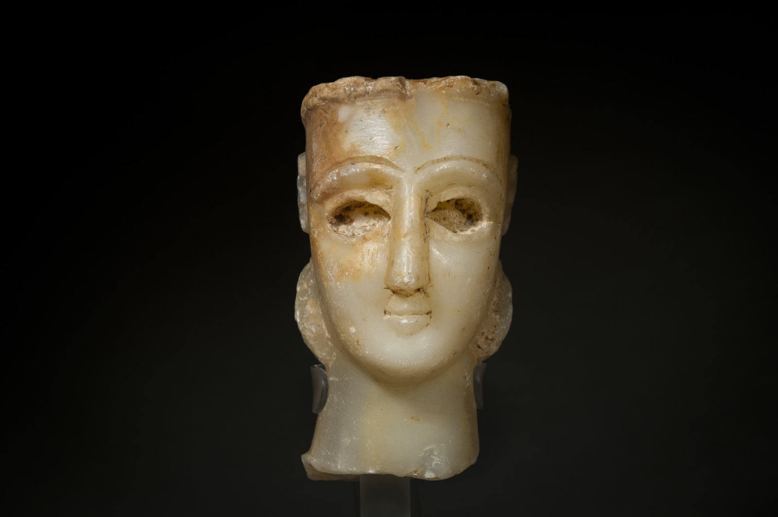 An Alabaster Head of a Sabaean Male., South Arabia, Sabaa, circa 1st millennium B.C.E.