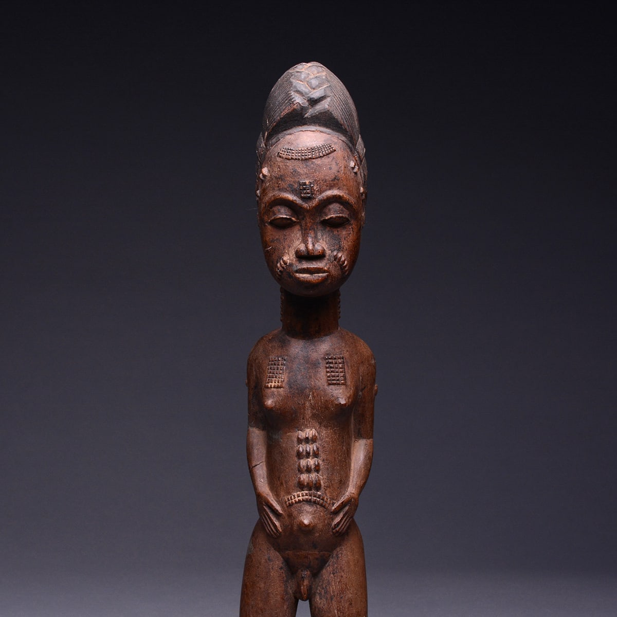 Baule Blolo Bian Sculpture of a Standing Man, 20th Century CE