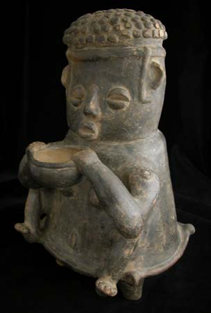 Tairona Sculpture of a Seated Woman Holding a Bowl, 900 CE - 1550 CE