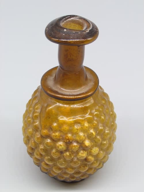Roman Mold-Blown Amber-Colored Glass Flask, 100 CE - 200 CE