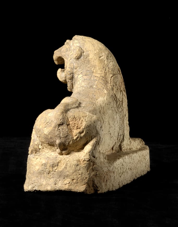 Assyrian Terracotta Sculpture of a Recumbent Lion, 900 BCE - 700 BCE