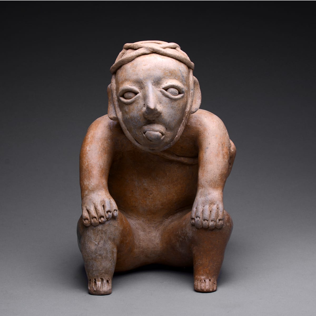 Ameca-Ezatlán Style Jalisco Sculpture of Seated Man, 300 BCE - 300 CE