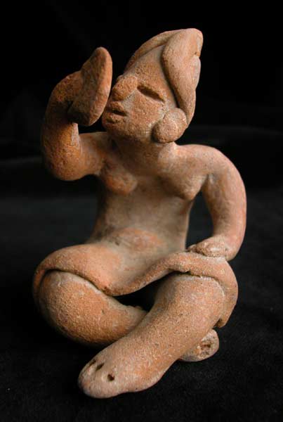 Sculpture of a Seated Woman Looking at a Mirror, 1200 BCE - 900 CE