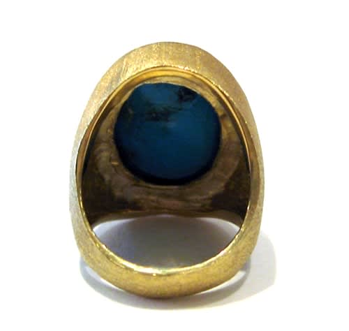 Cabochon Turquoise Set in an 18 Karat Gold Ring