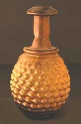 Roman Mold-Blown Amber-Colored Glass Flask, 100 CE - 200 CE